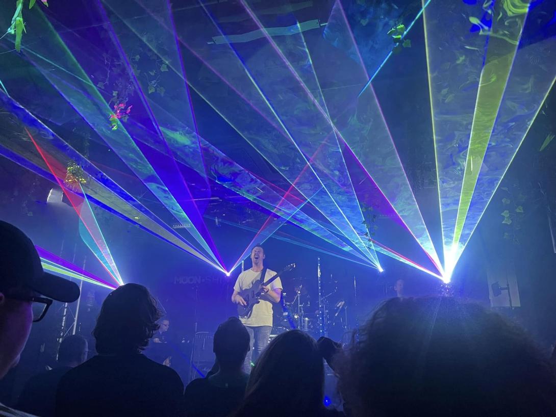 MUS3 tribute to Muse performing live on stage