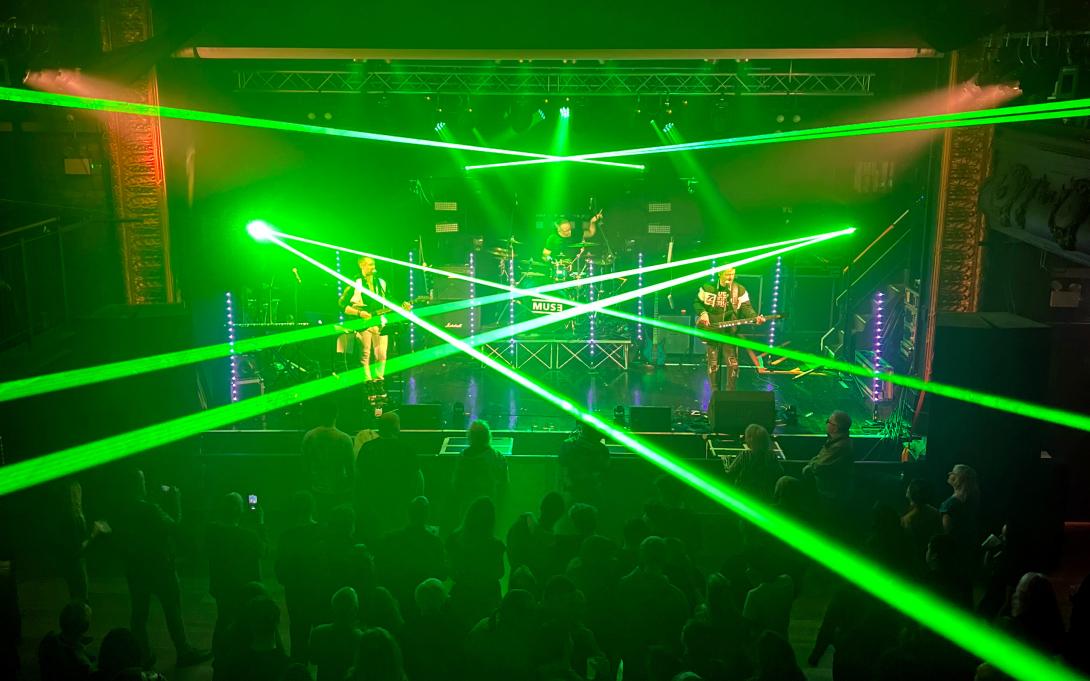 MUS3 live Muse tribute show with lighting and laser effects